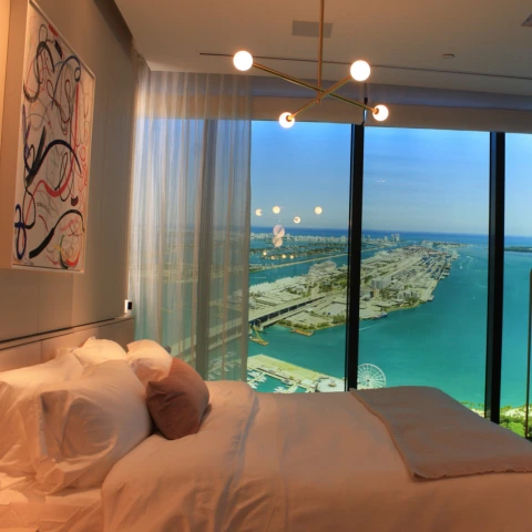 Condotel window showing the city of Miami